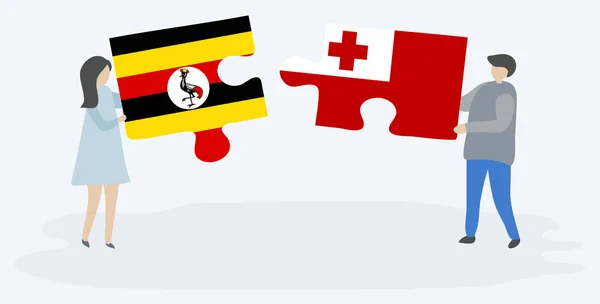 Casal Segurando Duas Peças Quebra Cabeças Com Bandeiras Uganda Tongan —  Vetores de Stock