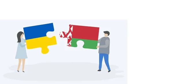 一对夫妇拿着两个拼图片与乌克兰和白俄罗斯国旗 乌克兰和白俄罗斯国家符号在一起 — 图库矢量图片