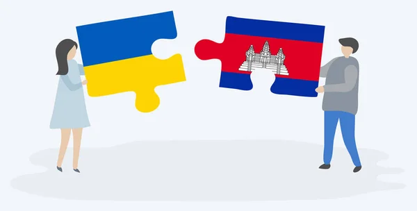 Par Som Innehar Två Pusselbitar Med Ukrainska Och Kambodjanska Flaggor — Stock vektor