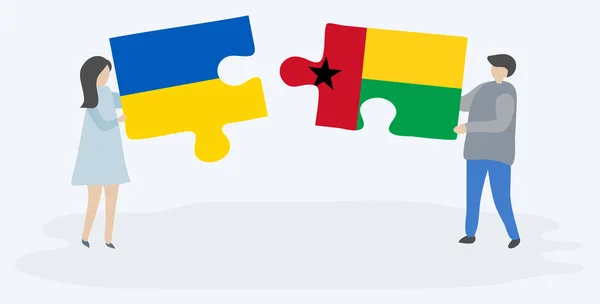 Çift Ukrayna Bissau Gine Bayrakları Ile Iki Bulmaca Parçaları Tutan — Stok Vektör