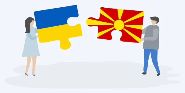 Casal Segurando Duas Peças Quebra Cabeças Com Bandeiras Ucranianas Macedônias —  Vetores de Stock