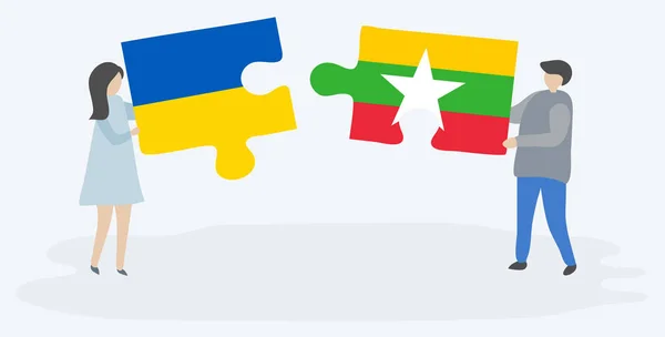 Couple Holding Two Puzzles Pieces Ukrainian Burmese Flags Ukraine Myanmar — Stock Vector