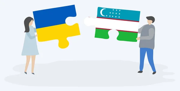 Пара Держащая Две Головоломки Украинским Узбекским Флагами Государственные Символы Украины — стоковый вектор