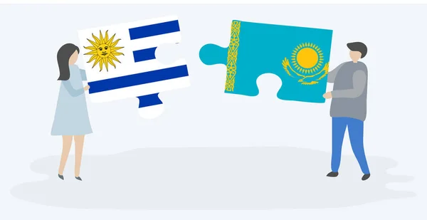 Para Trzyma Dwa Kawałki Puzzli Urugwajskim Kazachskim Flagi Symbole Narodowe — Wektor stockowy