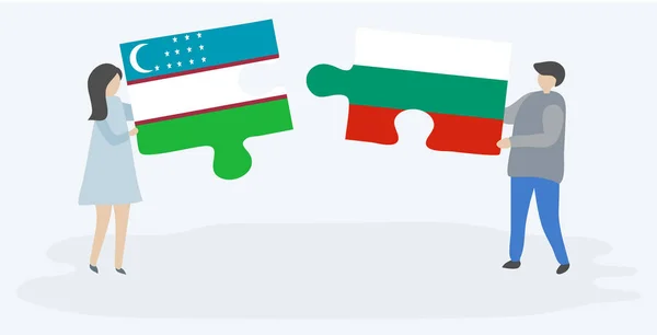 Pareja Sosteniendo Dos Piezas Rompecabezas Con Banderas Uzbekistán Bulgaria Uzbekistán — Vector de stock