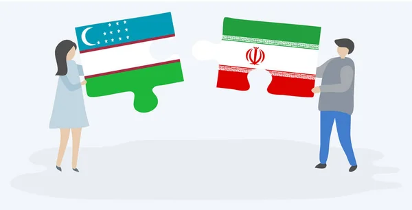 Dvojice Uzbeckými Íránskými Vlajkami Drží Dvě Skládanky Uzbekistán Írán Národní — Stockový vektor