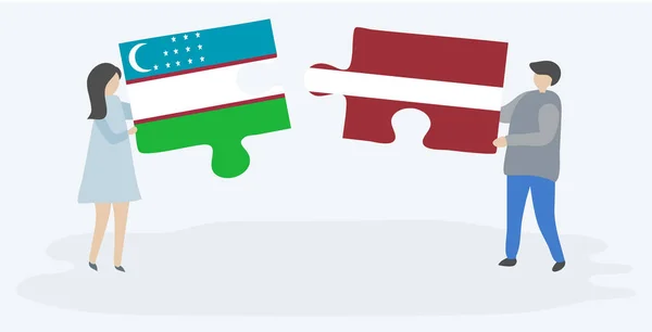 Пара Держащая Две Головоломки Узбекским Латвийским Флагами Национальные Символы Узбекистана — стоковый вектор