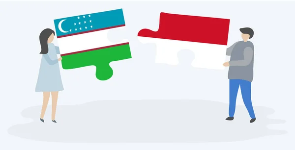 Pareja Sosteniendo Dos Piezas Rompecabezas Con Banderas Uzbecas Monegascas Uzbekistán — Vector de stock