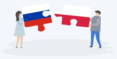 Rus ve Polonya bayrakları ile iki bulmaca parçaları tutan çift. Rusya ve Polonya ulusal sembolleri birlikte.