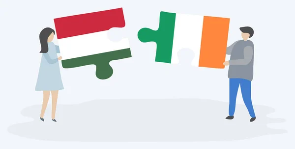 Couple Tenant Deux Pièces Puzzles Avec Des Drapeaux Hongrois Irlandais — Image vectorielle