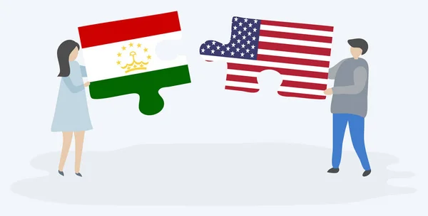 Dvojice Drží Dvě Skládanky Tádžické Americkými Vlajkami Národní Symboly Tádžikistánu — Stockový vektor