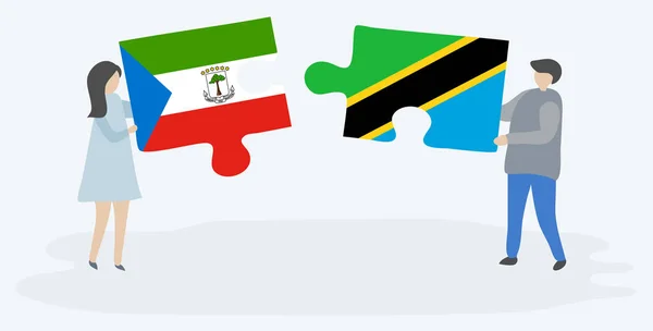 Pareja Sosteniendo Dos Piezas Rompecabezas Con Banderas Guinea Ecuatorial Tanzania — Vector de stock