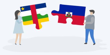 Orta Afrika ve Haiti bayrakları ile iki bulmaca parçaları tutan çift. Orta Afrika Cumhuriyeti ve Haiti ulusal sembolleri birlikte.