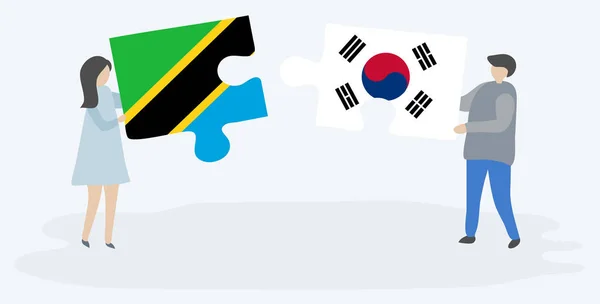 Couple Tenant Deux Pièces Puzzles Avec Des Drapeaux Tanzaniens Sud — Image vectorielle