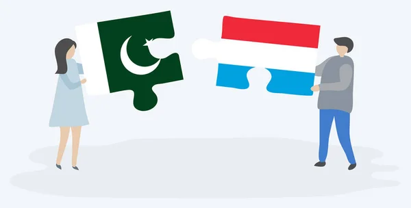 Paar Houden Twee Puzzels Stukken Met Pakistaanse Luxemburgse Vlaggen Pakistan — Stockvector