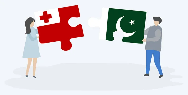 Casal Segurando Duas Peças Quebra Cabeças Com Bandeiras Tongan Paquistanesas — Vetor de Stock
