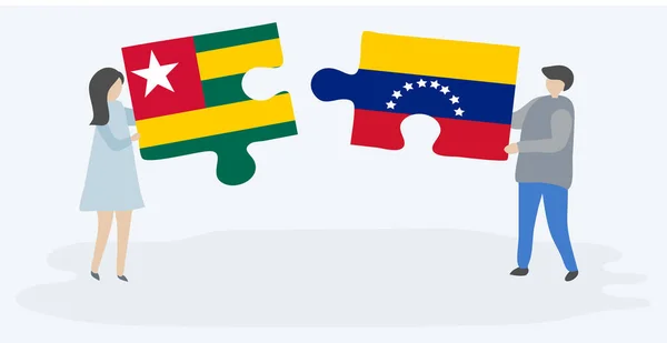 Пара Держащая Две Головоломки Тоголезскими Венесуэльскими Флагами Государственные Символы Венесуэлы — стоковый вектор