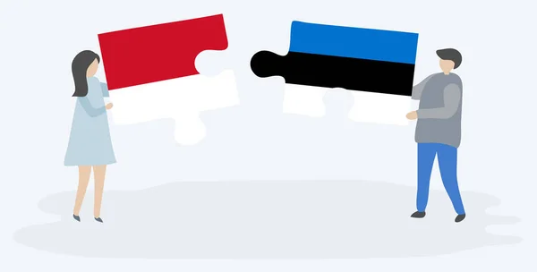 Pareja Sosteniendo Dos Piezas Rompecabezas Con Banderas Indonesia Estonia Indonesia — Vector de stock