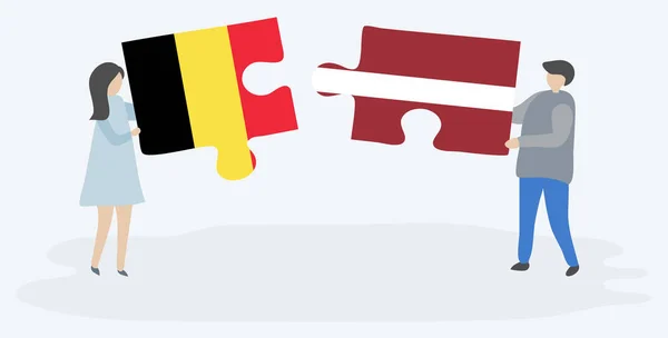 Para Trzyma Dwa Kawałki Puzzli Belgijskich Łotewskich Flag Belgijskie Łotewskie — Wektor stockowy