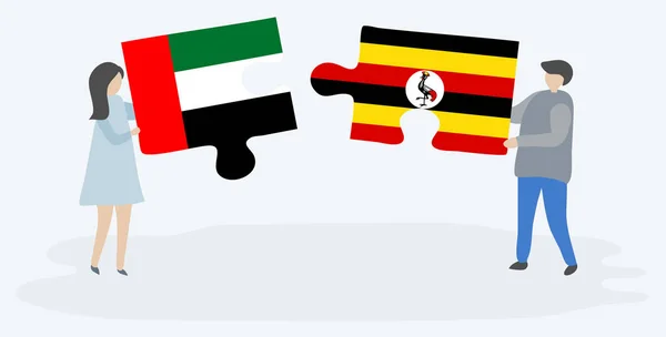Para Trzyma Dwa Kawałki Puzzli Flagami Emirian Ugandy Zjednoczone Emiraty — Wektor stockowy