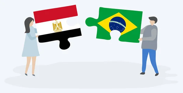 Ζευγάρι Που Κρατά Δύο Κομμάτια Παζλ Αιγυπτιακές Και Βραζιλιάνες Σημαίες — Διανυσματικό Αρχείο