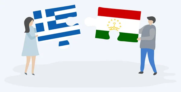 Dvojice Která Drží Dvě Skládanky Řeckými Tádžické Vlajkami Národní Symboly — Stockový vektor