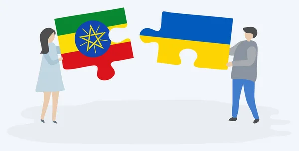 Çift Etiyopya Ukrayna Bayrakları Ile Iki Bulmaca Parçaları Tutan Etiyopya — Stok Vektör