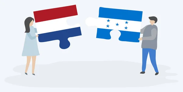 Pareja Sosteniendo Dos Piezas Rompecabezas Con Banderas Holandesas Hondureñas Países — Archivo Imágenes Vectoriales