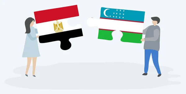 Dvojice Egyptskými Uzbeckými Vlajkami Drží Dvě Skládanky Národní Symboly Egypta — Stockový vektor