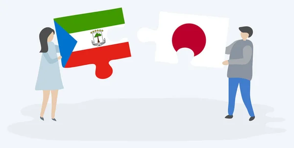 Casal Segurando Dois Quebra Cabeças Com Bandeiras Guiné Equatorial Japão — Vetor de Stock