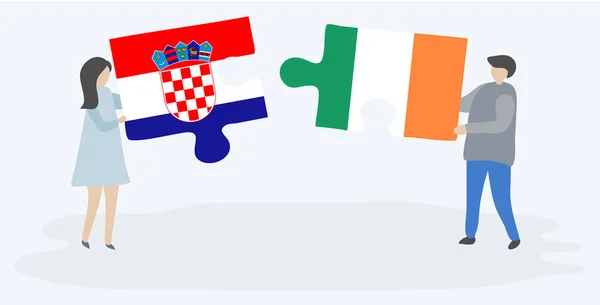 Casal Segurando Duas Peças Quebra Cabeças Com Bandeiras Croatas Irlandesas — Vetor de Stock
