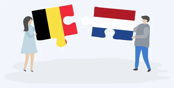 Ζευγάρι Που Κρατά Δύο Κομμάτια Παζλ Βελγικές Και Ολλανδικές Σημαίες — Διανυσματικό Αρχείο