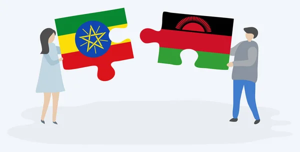 Casal Segurando Duas Peças Quebra Cabeças Com Bandeiras Etíopes Malaias — Vetor de Stock
