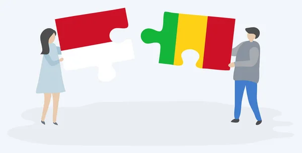 Couple Tenant Deux Pièces Puzzles Avec Des Drapeaux Indonésien Malien — Image vectorielle