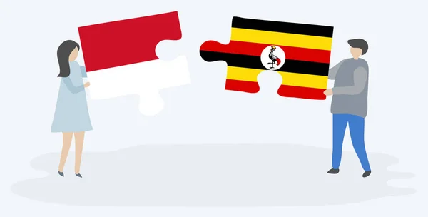 Casal Segurando Duas Peças Quebra Cabeças Com Bandeiras Indonésias Ugandenses —  Vetores de Stock