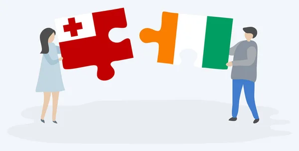 Paar Houden Twee Puzzels Stukken Met Tongaanse Ivoriaanse Vlaggen Tonga — Stockvector