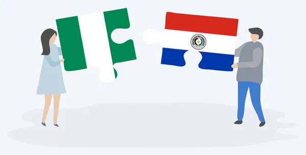 Casal Segurando Duas Peças Quebra Cabeças Com Bandeiras Nigerianas Paraguaias —  Vetores de Stock