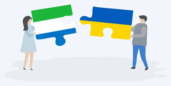 Pareja Sosteniendo Dos Piezas Rompecabezas Con Banderas Sierra Leona Ucrania — Vector de stock