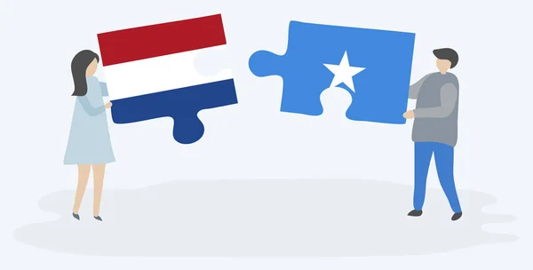 Néhány Holding Két Rejtvények Darab Holland Szomáliai Zászlók Holland Szomáliai — Stock Vector