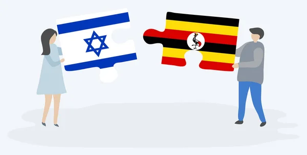 Para Trzymania Dwóch Puzzli Izraelskich Ugandy Flagi Izrael Uganda Symbole — Wektor stockowy