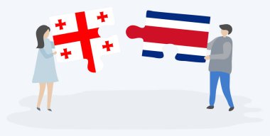 Gürcü ve Kosta Rika bayrakları ile iki bulmaca parçaları tutan çift. Gürcistan ve Kosta Rika ulusal sembolleri birlikte.