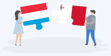 Lüksemburg ve Malta bayrakları ile iki bulmaca parçaları tutan çift. Lüksemburg ve Malta ulusal sembolleri birlikte.