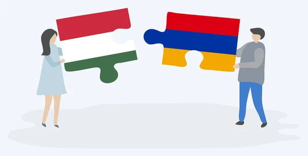 一对夫妇拿着两块拼图 上面挂着匈牙利和亚美尼亚国旗 匈牙利和亚美尼亚国家符号在一起 — 图库矢量图片