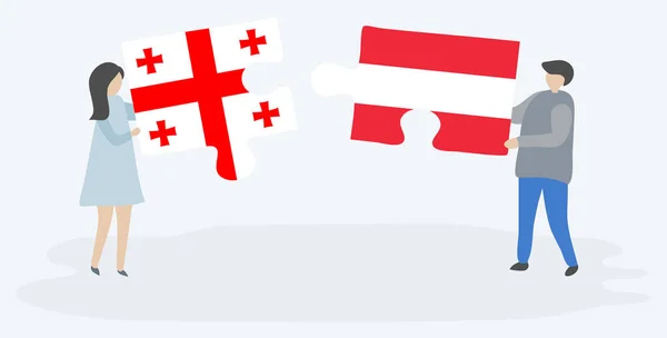 Pár Jich Drží Dvě Skládanky Gruzínskými Rakouskými Vlajkami Gruzie Rakousko — Stockový vektor