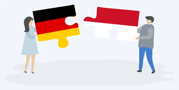 Couple Tenant Deux Pièces Puzzles Avec Des Drapeaux Allemands Indonésiens — Image vectorielle