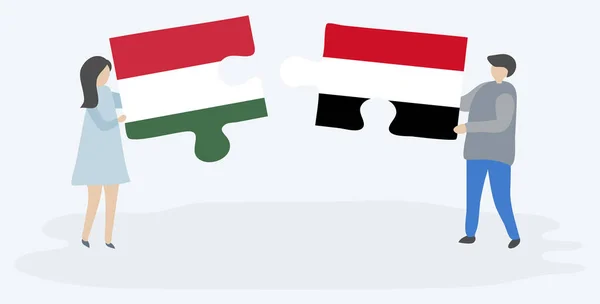 Ζευγάρι Που Κρατά Δύο Κομμάτια Παζλ Τις Σημαίες Της Ουγγαρίας — Διανυσματικό Αρχείο