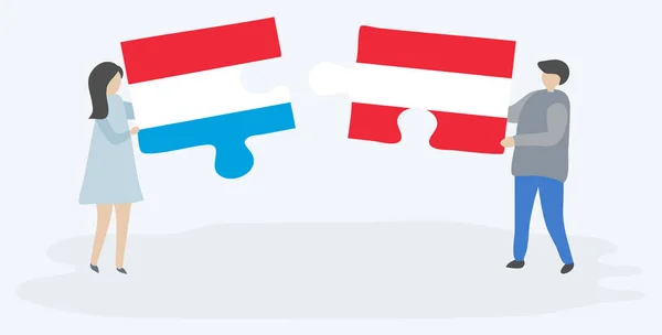 Paar Houden Twee Puzzels Stukken Met Luxemburgse Oostenrijkse Vlaggen Nationale — Stockvector