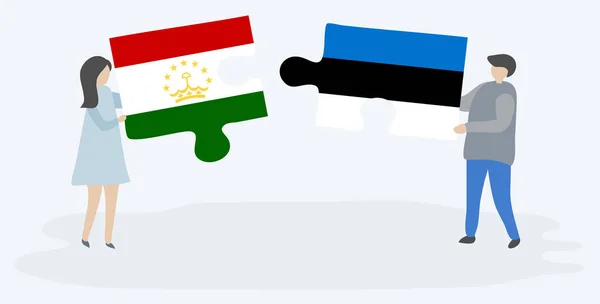 Tacikistani Estonya Bayrakları Ile Iki Bulmaca Parçaları Tutan Çift Tacikistan — Stok Vektör