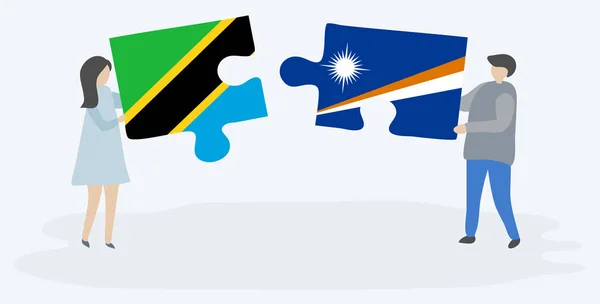 Pareja Sosteniendo Dos Piezas Rompecabezas Con Banderas Tanzania Marshallese Tanzania — Vector de stock