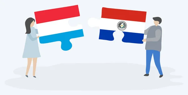 一对夫妇拿着两块拼图 上面挂着卢森堡和巴拉圭国旗 卢森堡和巴拉圭国家符号在一起 — 图库矢量图片
